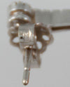 Pendientes en oro blanco 18k con brillantes y ónix central - Mayka Jewels