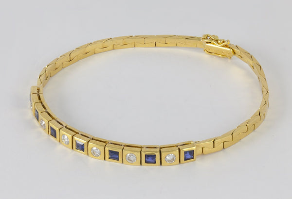 Pulsera de oro amarillo 18k con brillantes y zafiros - Mayka Jewels