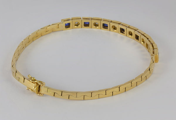 Pulsera de oro amarillo 18k con brillantes y zafiros - Mayka Jewels