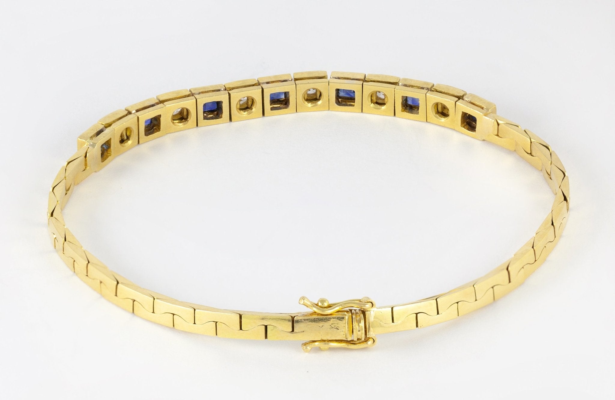 Pulsera de oro amarillo 18k con brillantes y zafiros - Mayka Jewels