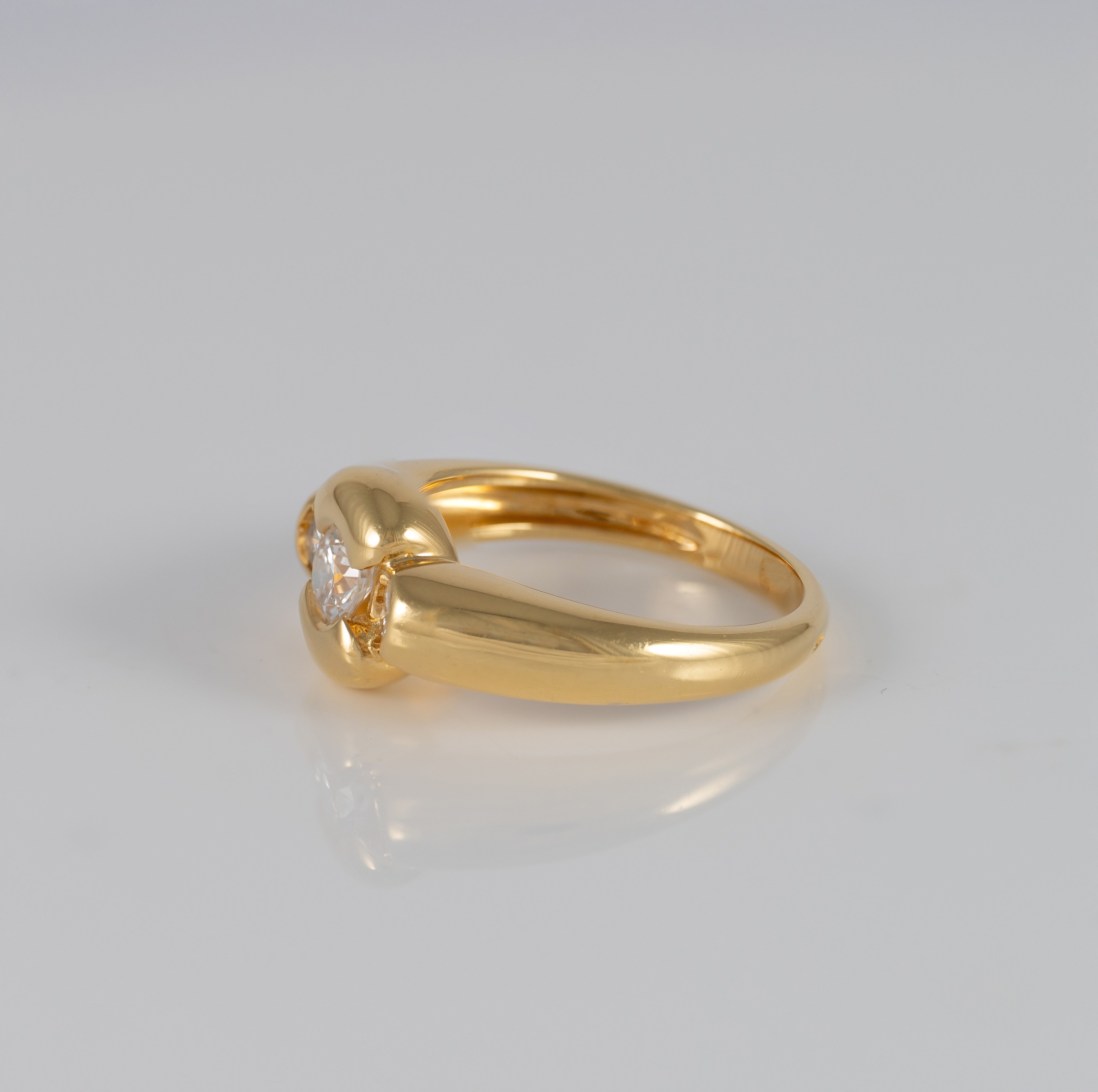 Anillo de oro amarillo 18k y brillantes