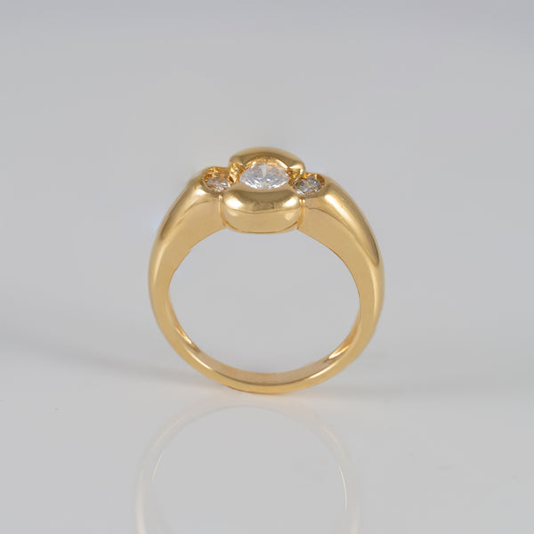 Anillo de oro amarillo 18k y brillantes