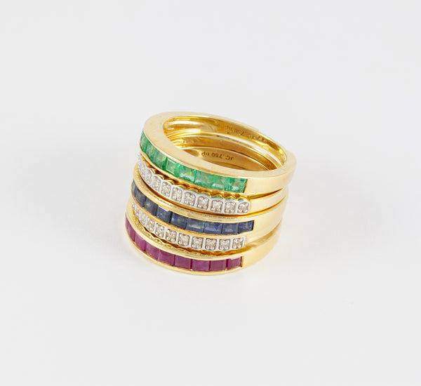 Anillo Infinity en oro amarillo 18k con diamantes zafiros rubíes y esmeraldas