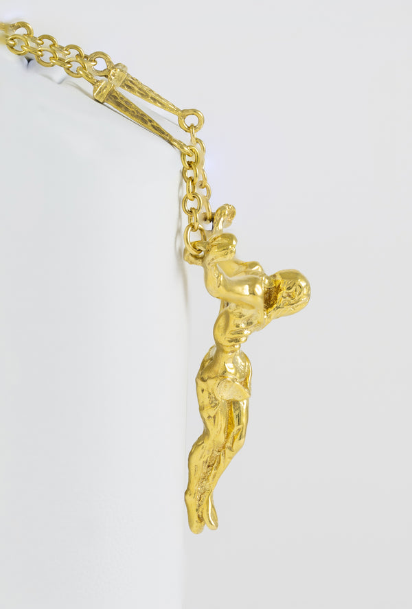 Cadena de clavos y cristo de Dalí en oro amarillo 18k