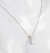 Cadena con colgante en oro blanco 18k con diamantes