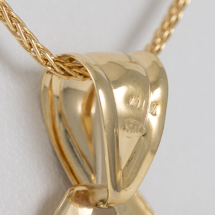 Colgante pergamino de oro 18k 750