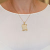 Colgante pergamino de oro 18k 750