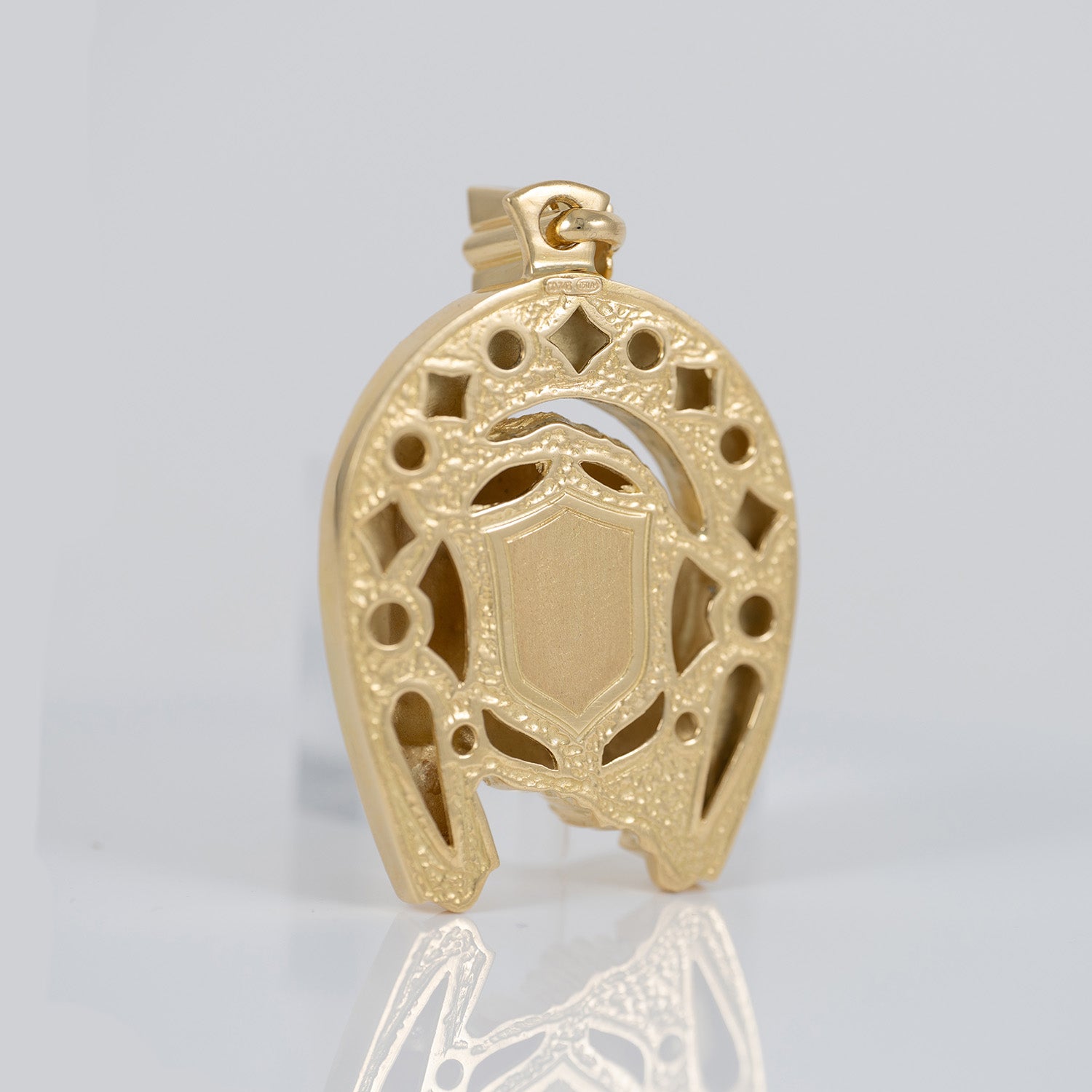 Colgante herradura caballo oro 18k 750
