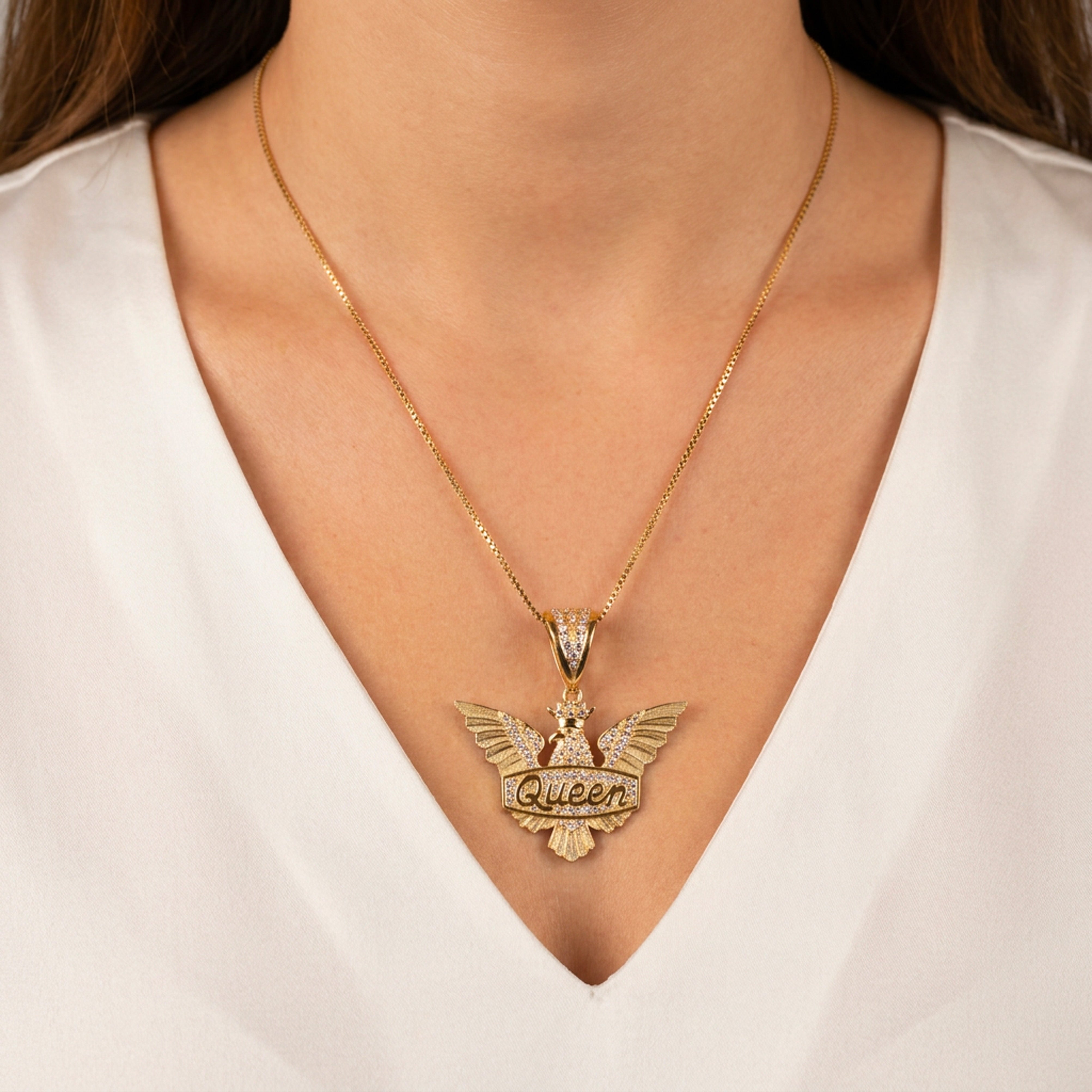 Colgante águila Queen oro 18k 750