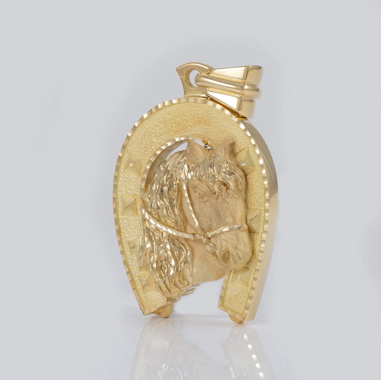 Colgante herradura caballo oro 18k 750