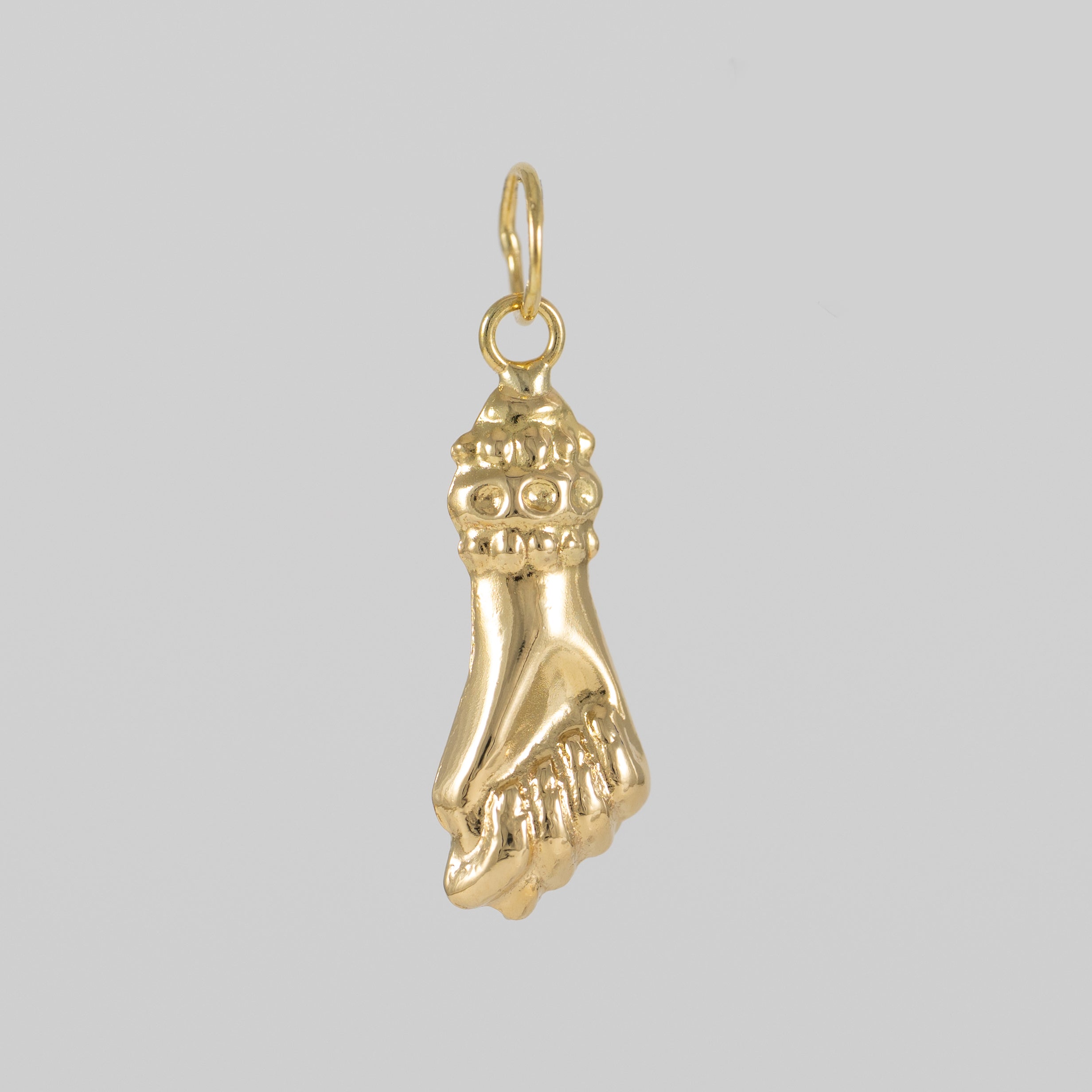 Colgante Puño oro 18k 750