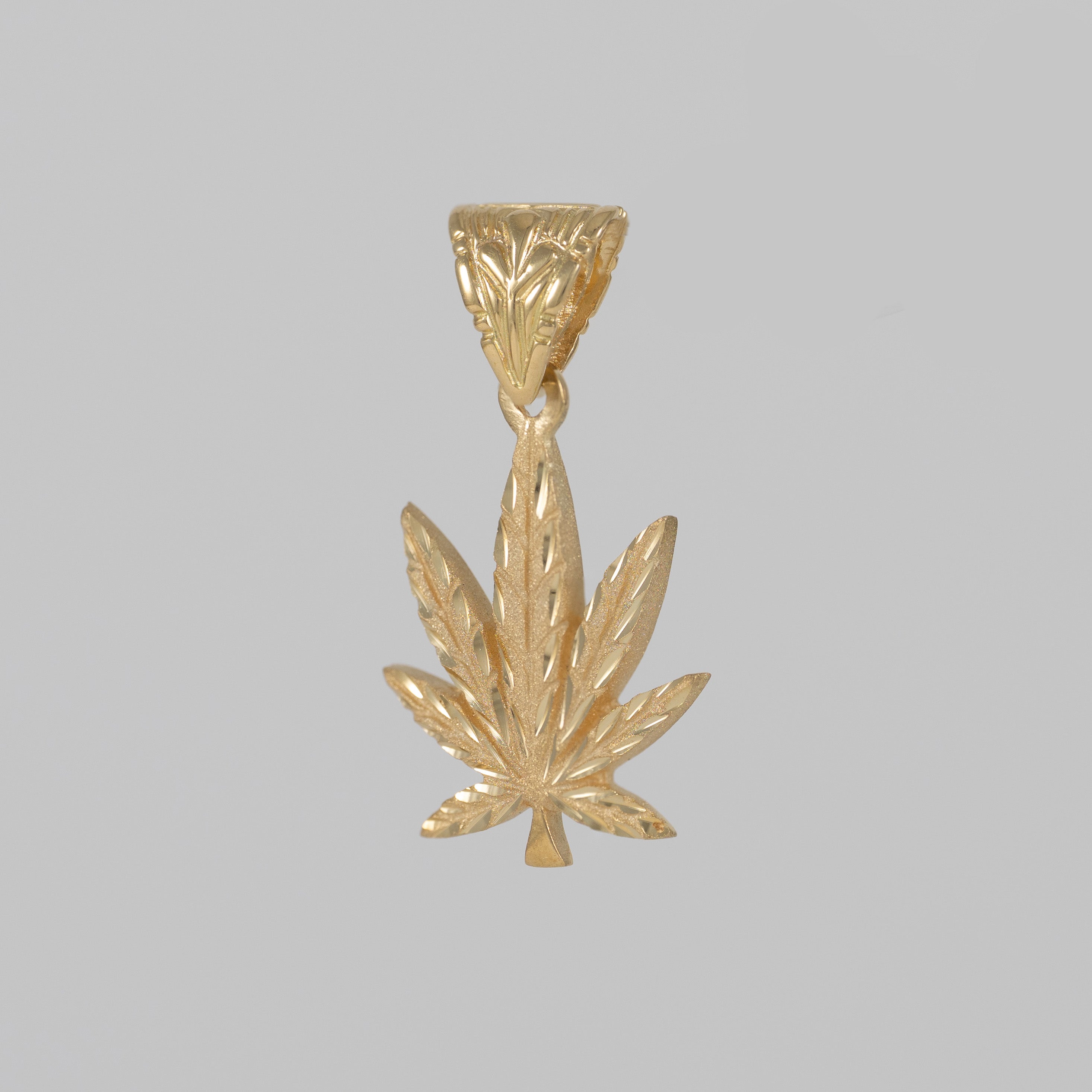 Colgante Hoja Marihuana oro 18k 750