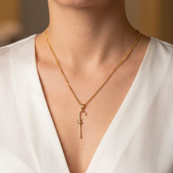 Colgante bastón cachaba oro 18k 750