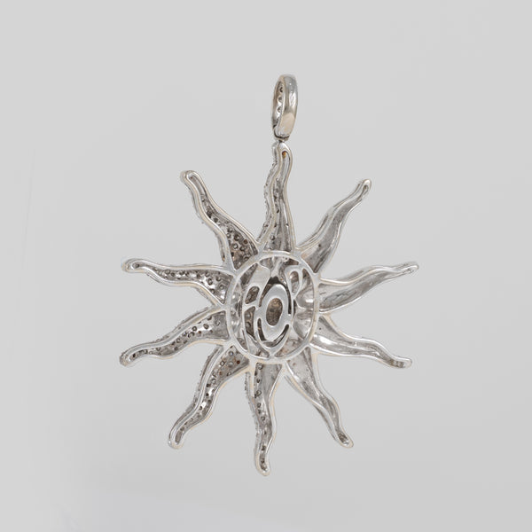 Colgante Sol de oro blanco 18k con brillantes