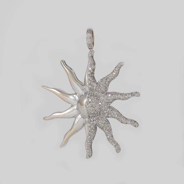 Colgante Sol de oro blanco 18k con brillantes