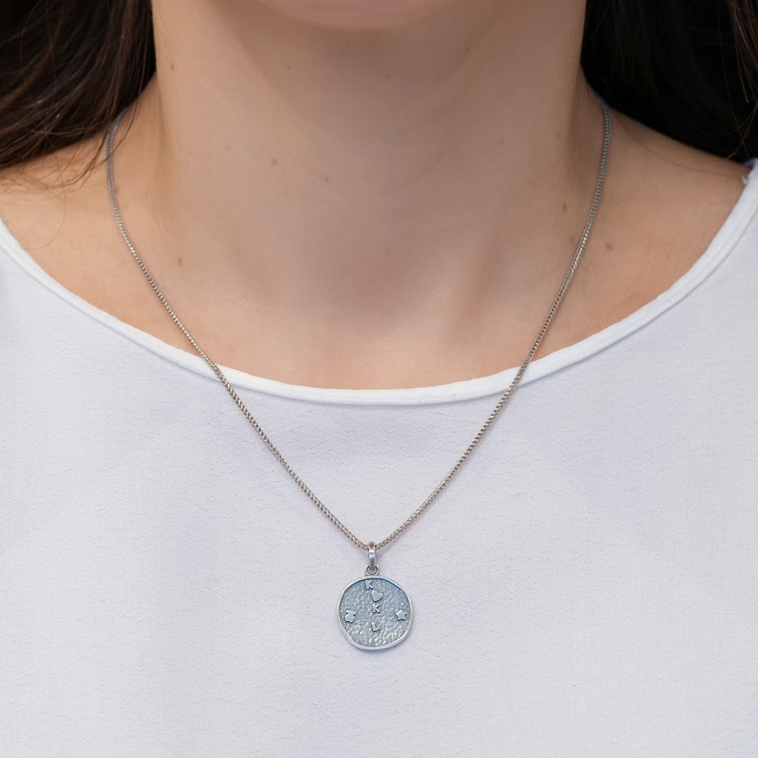 Colgante Medalla Tous en plata 925