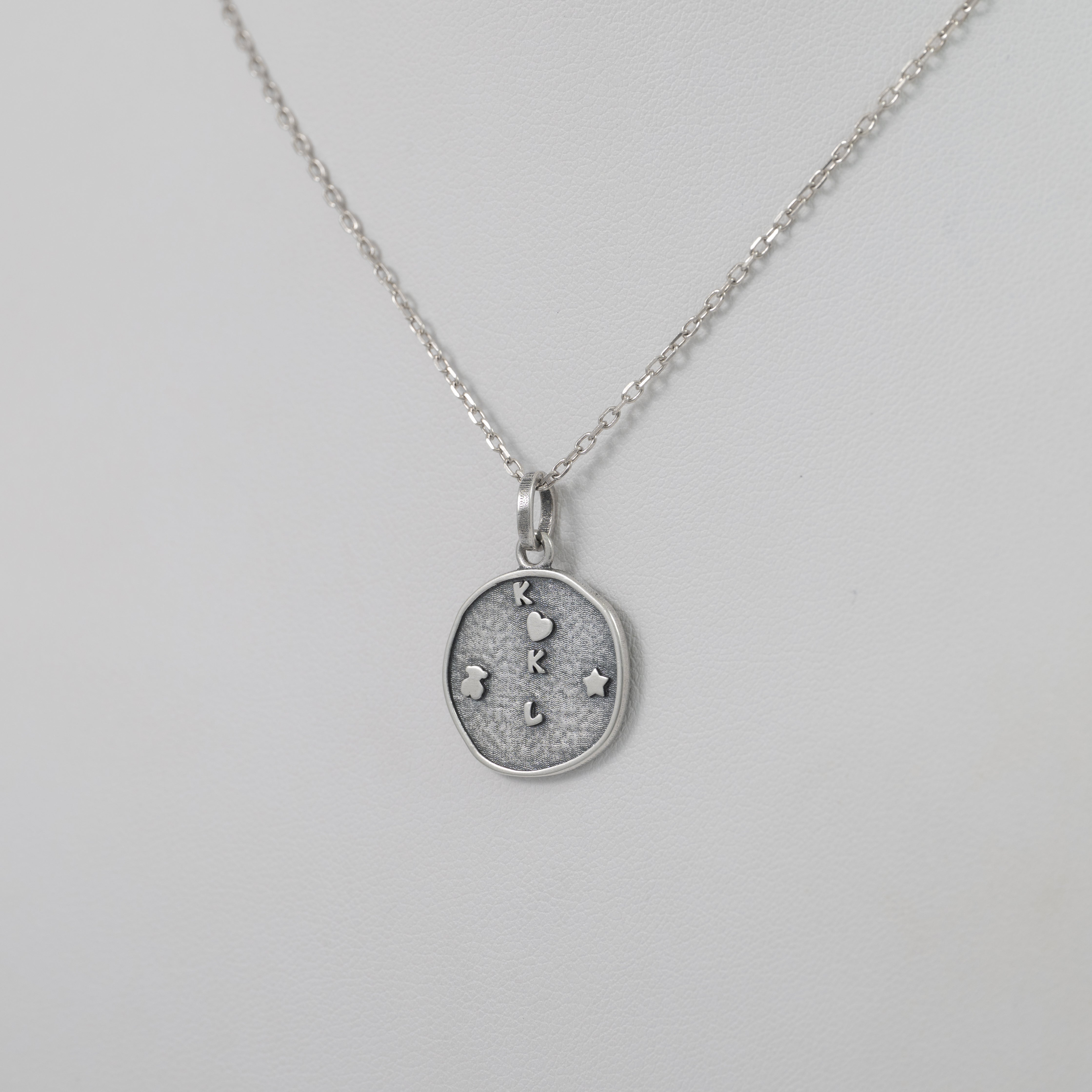 Colgante Medalla Tous en plata 925