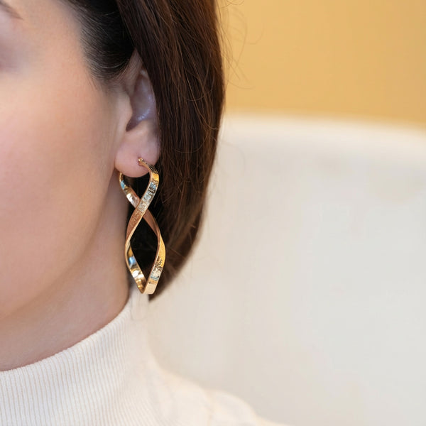 Pendientes de aro en oro 18k 750 forma de 8