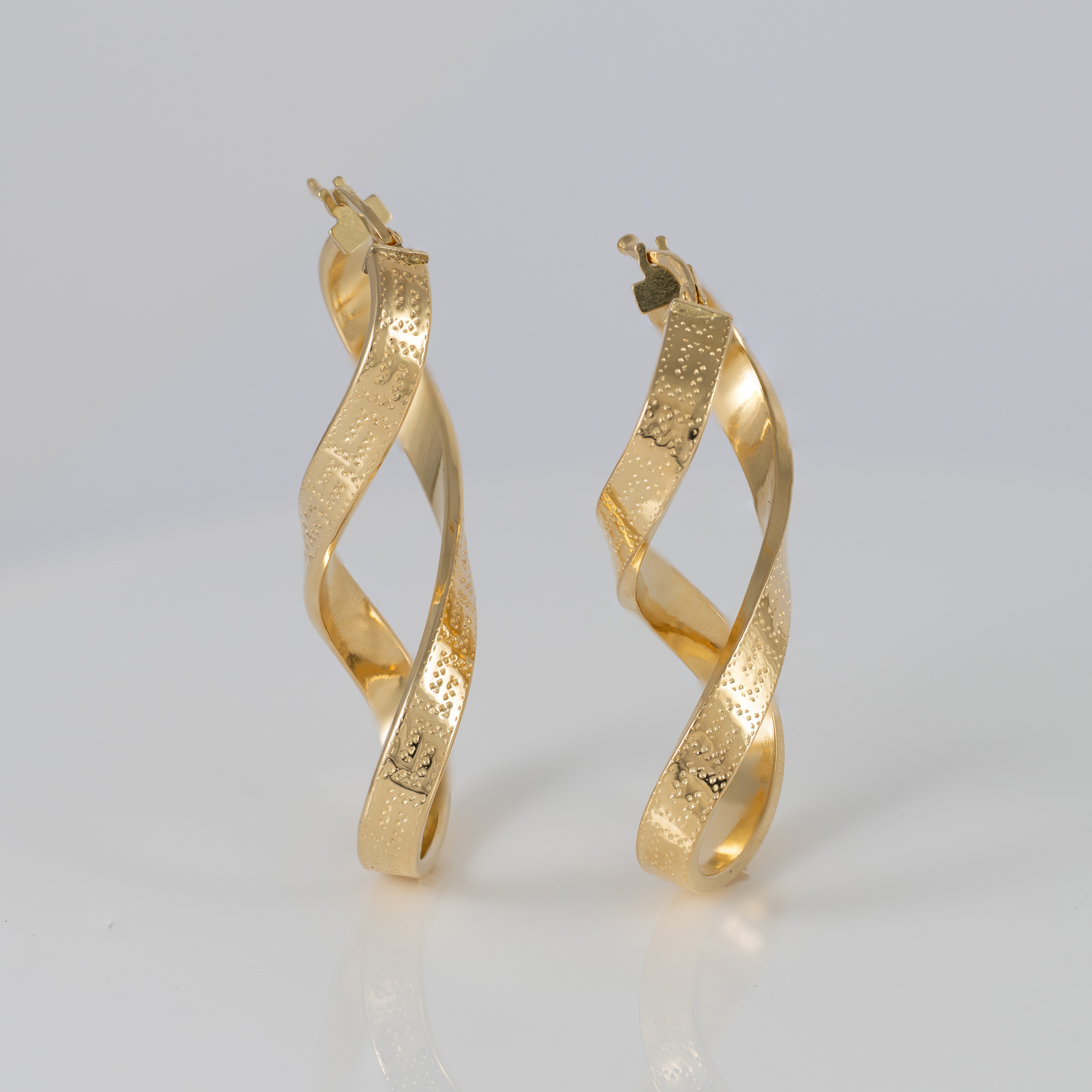 Pendientes de aro en oro 18k 750 forma de 8
