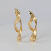 Pendientes de aro en oro 18k 750 forma de 8