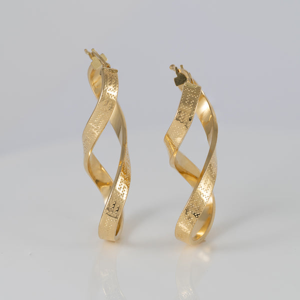 Pendientes de aro en oro 18k 750 forma de 8