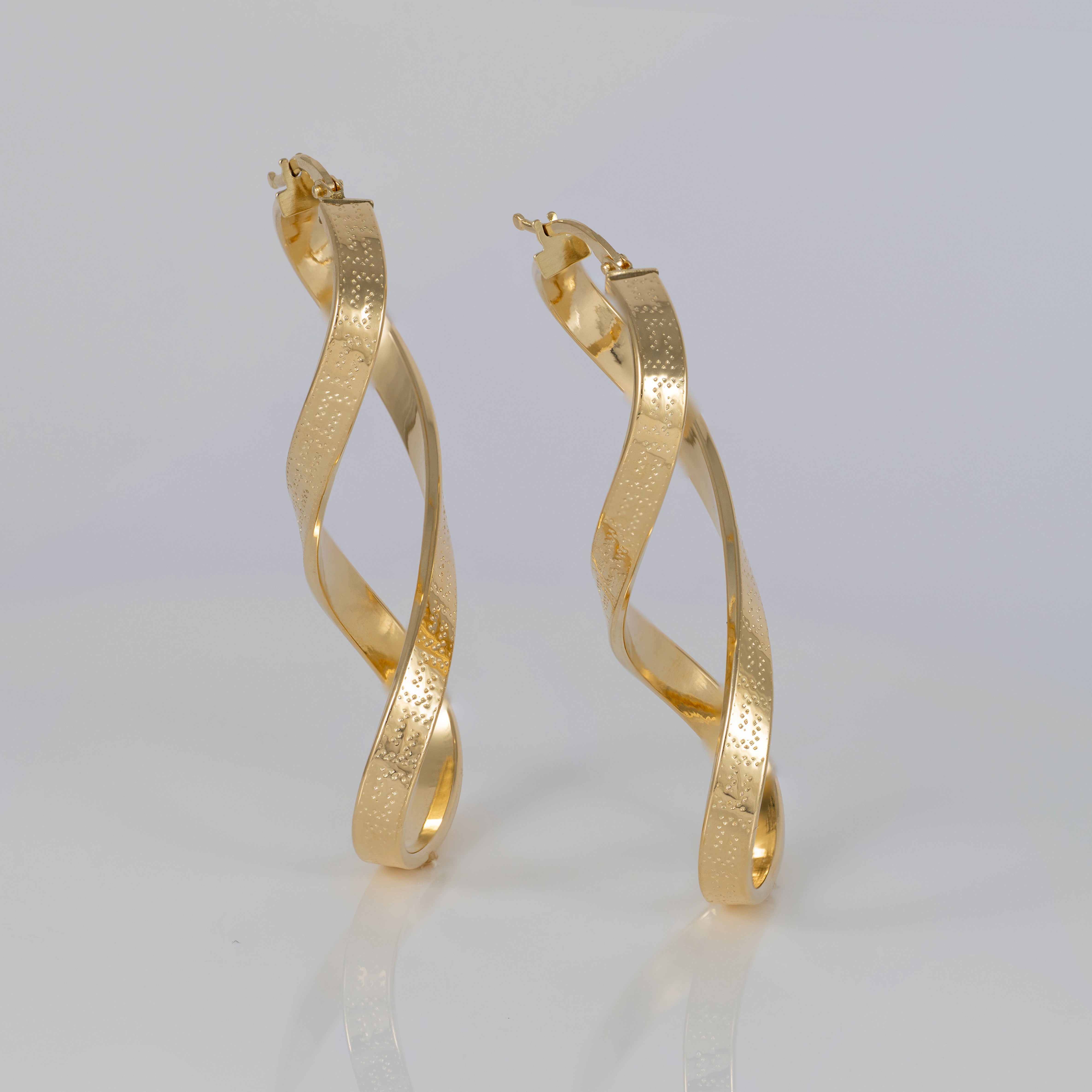 Pendientes de aro en oro 18k 750 forma de 8