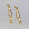 Pendientes de aro en oro 18k 750 forma de 8