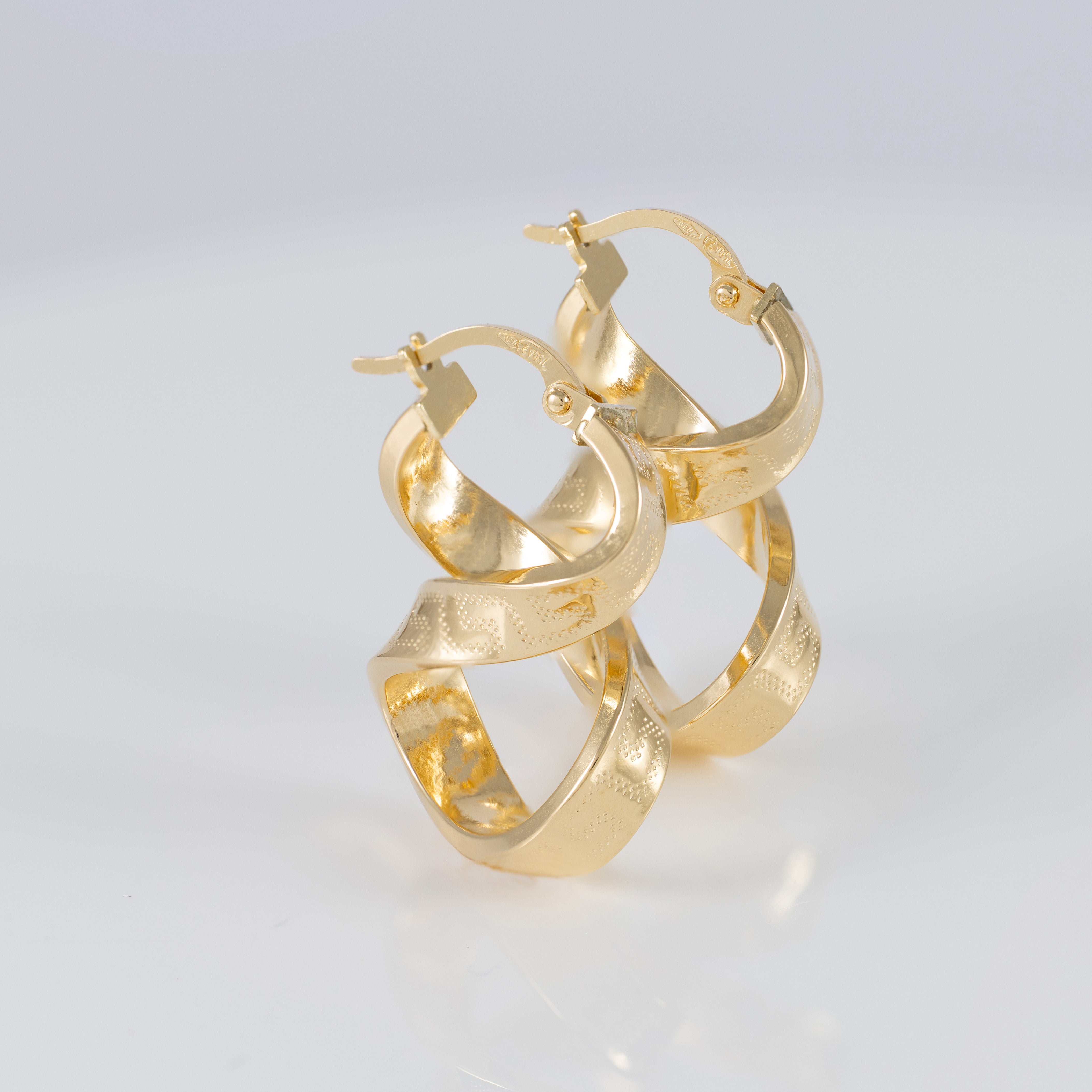 Pendientes de aro en oro 18k 750 forma de 8