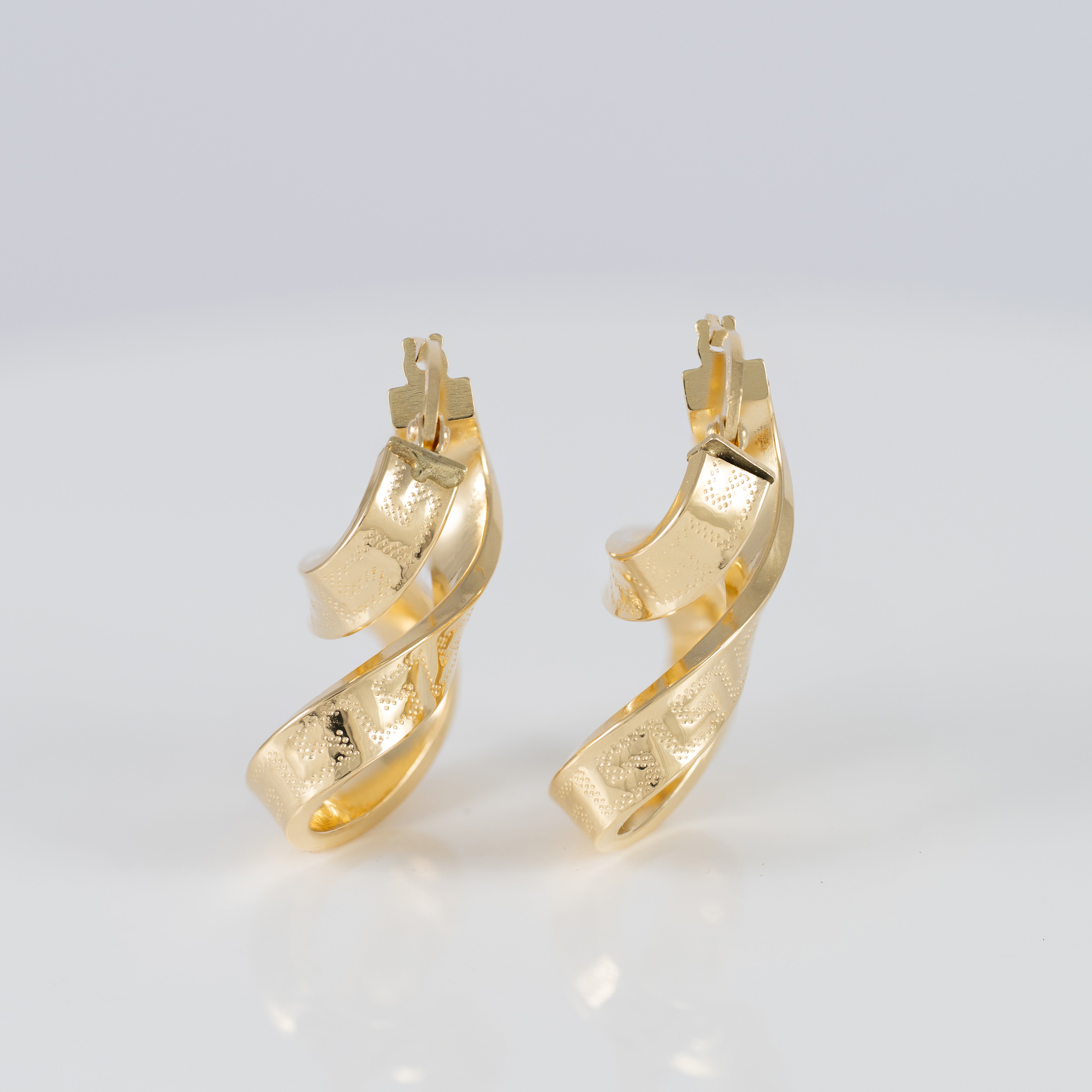 Pendientes de aro en oro 18k 750 forma de 8