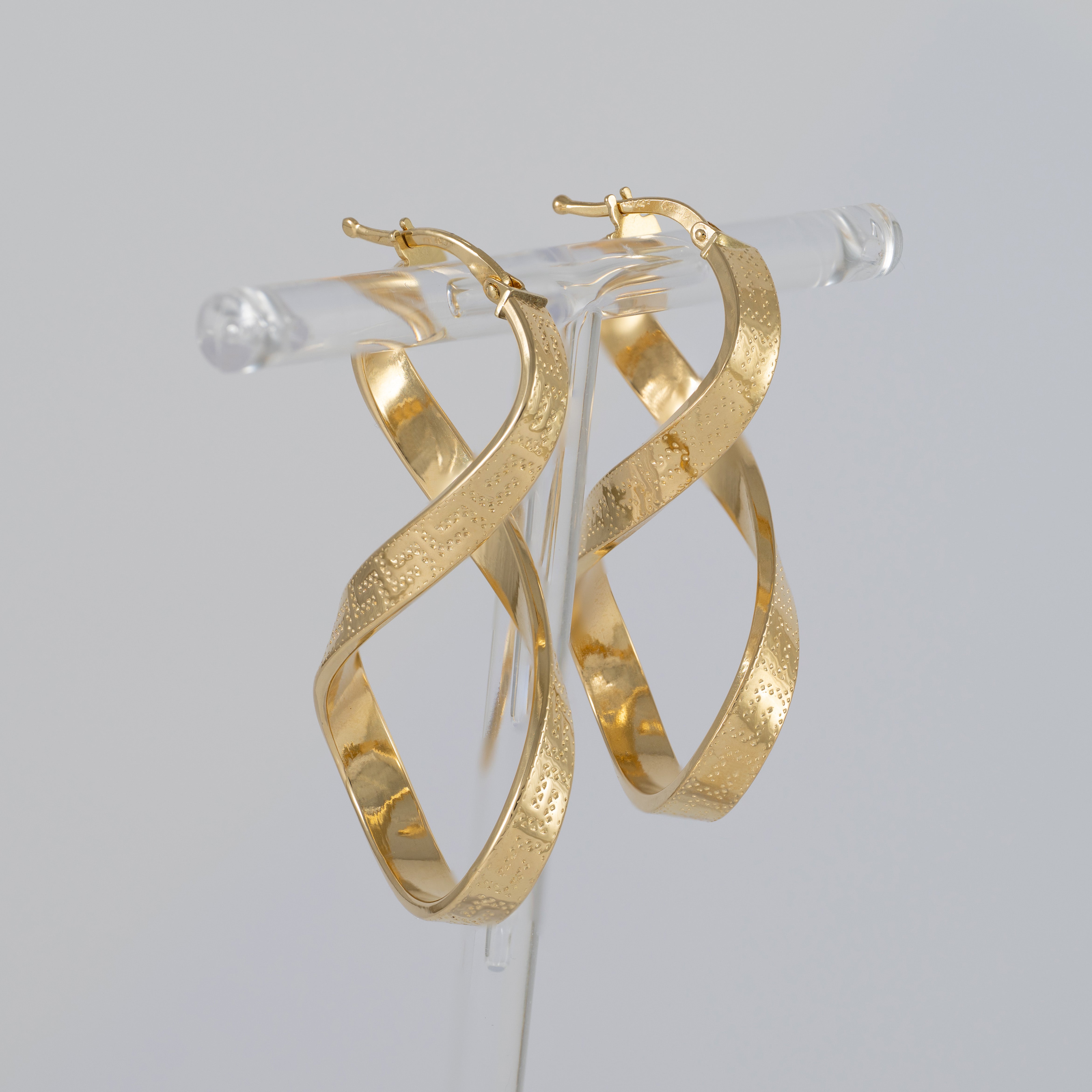 Pendientes de aro en oro 18k 750 forma de 8