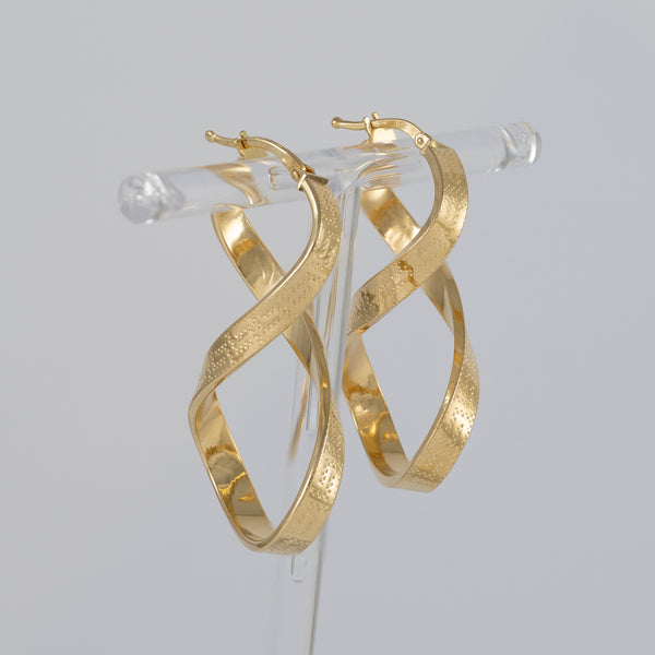 Pendientes de aro en oro 18k 750 forma de 8