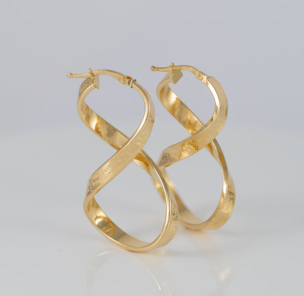 Pendientes de aro en oro 18k 750 forma de 8