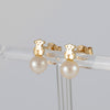 Pendientes Tous Puppies en oro amarillo de 18k y perlas cultivadas