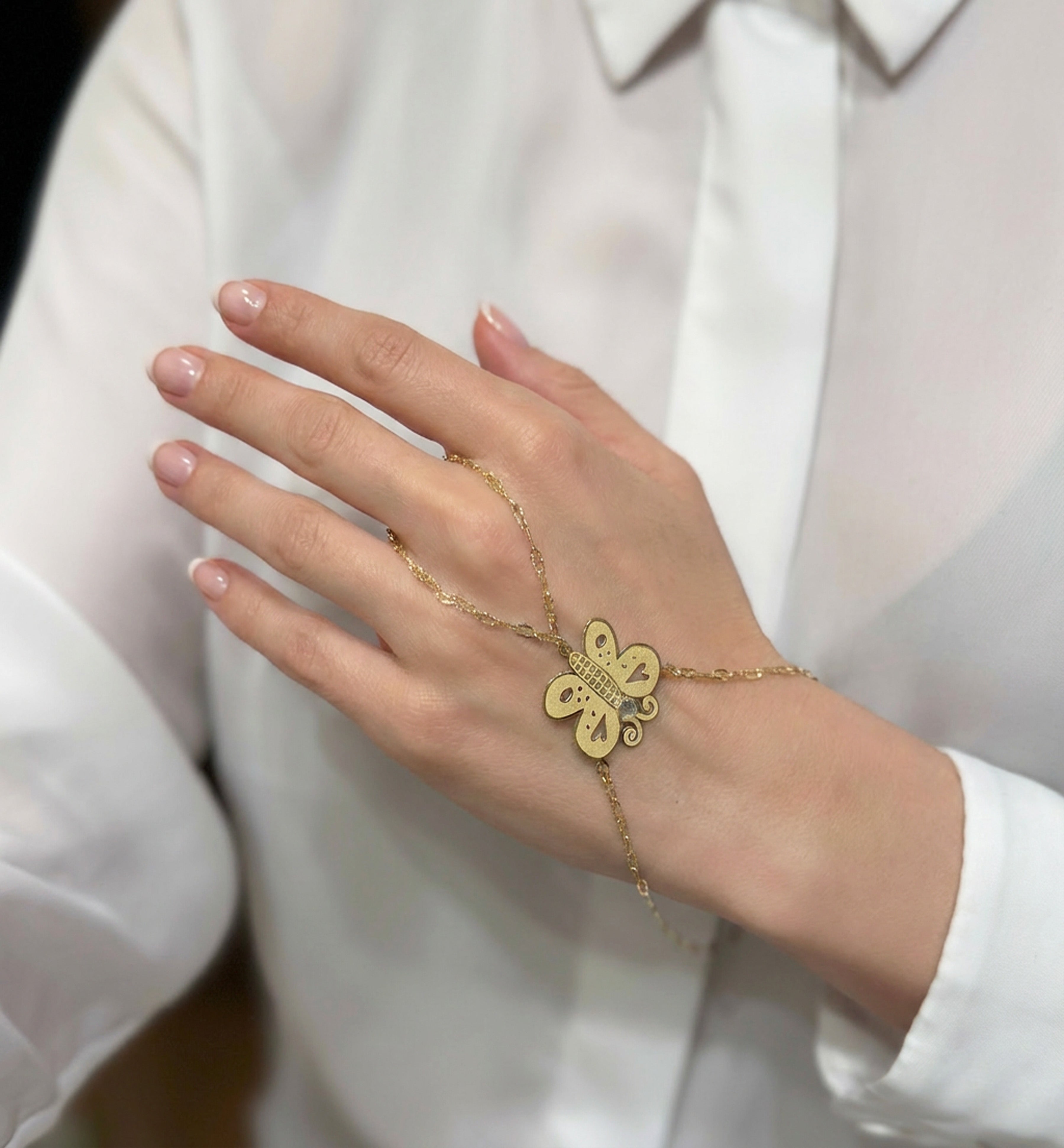 Pulsera pasamanos Mariposa oro 18k 750