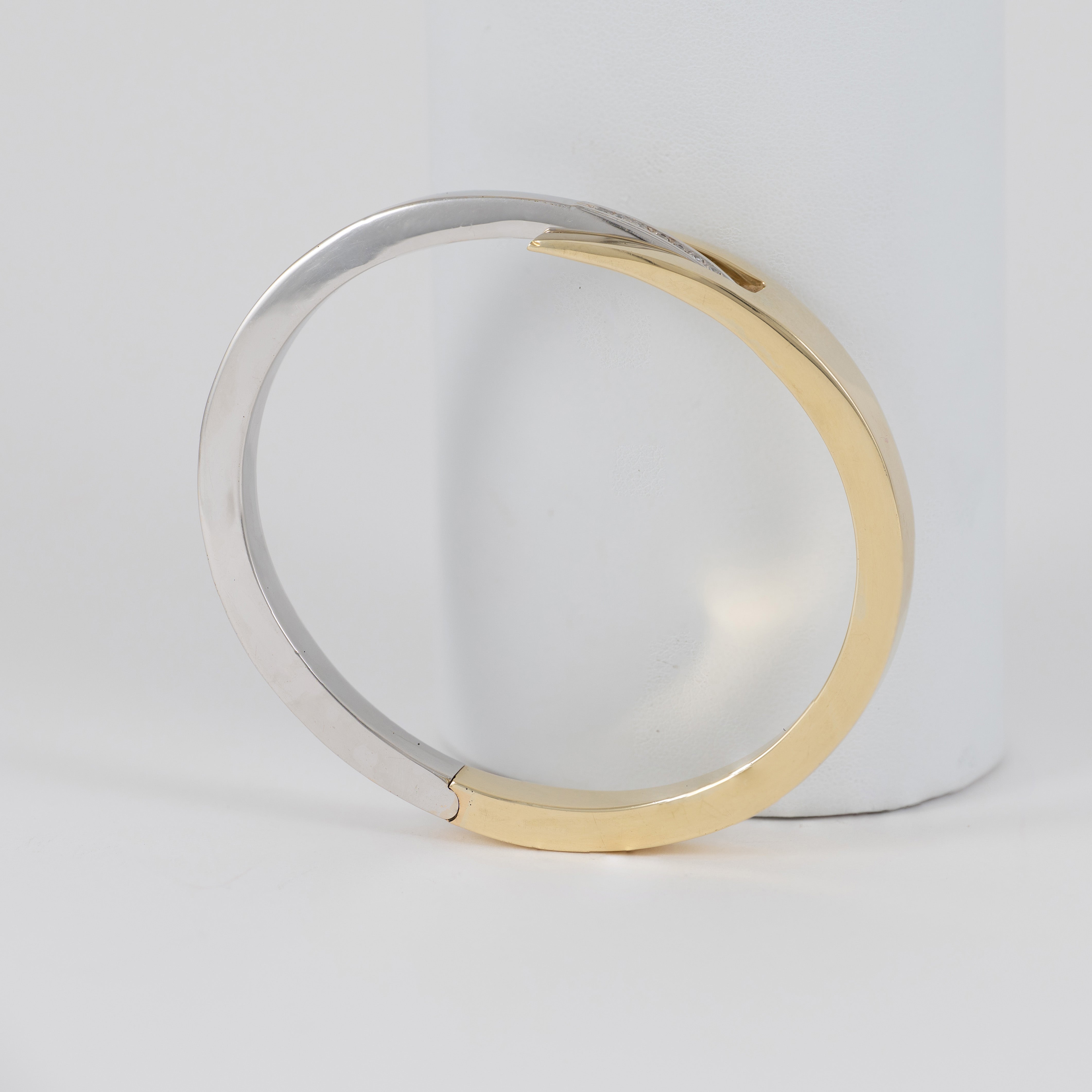 Pulsera en oro amarillo y blanco 18k 750