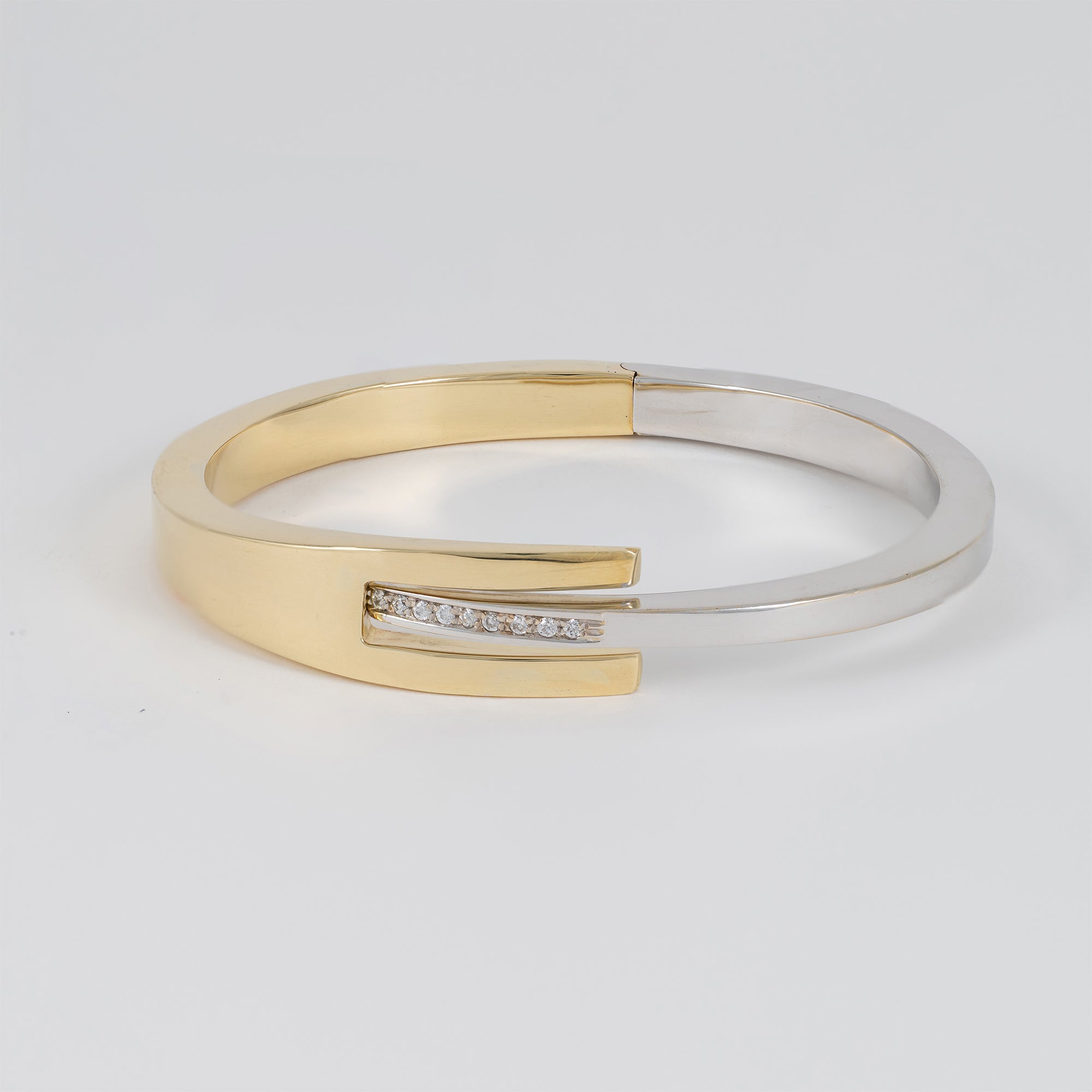 Pulsera en oro amarillo y blanco 18k 750