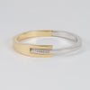Pulsera en oro amarillo y blanco 18k 750
