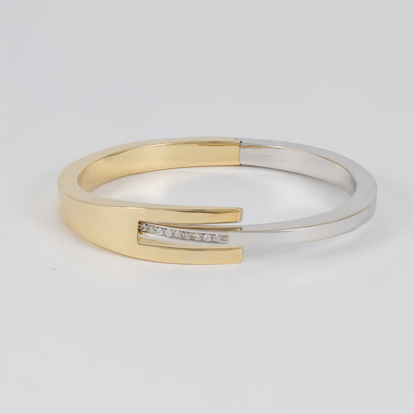 Pulsera en oro amarillo y blanco 18k 750