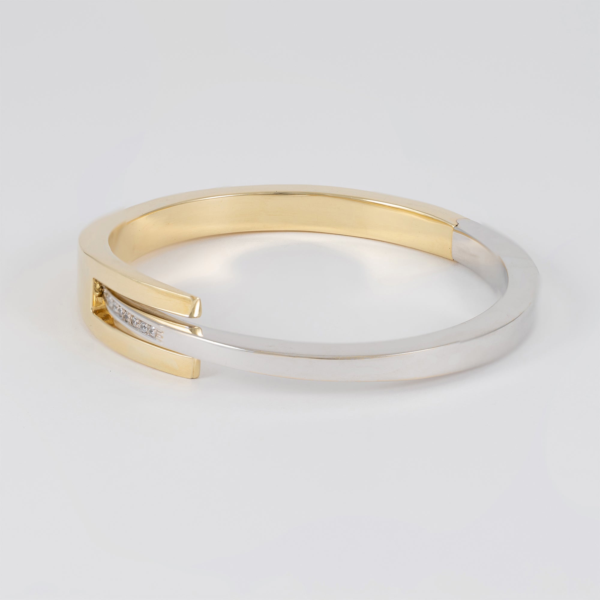 Pulsera en oro amarillo y blanco 18k 750