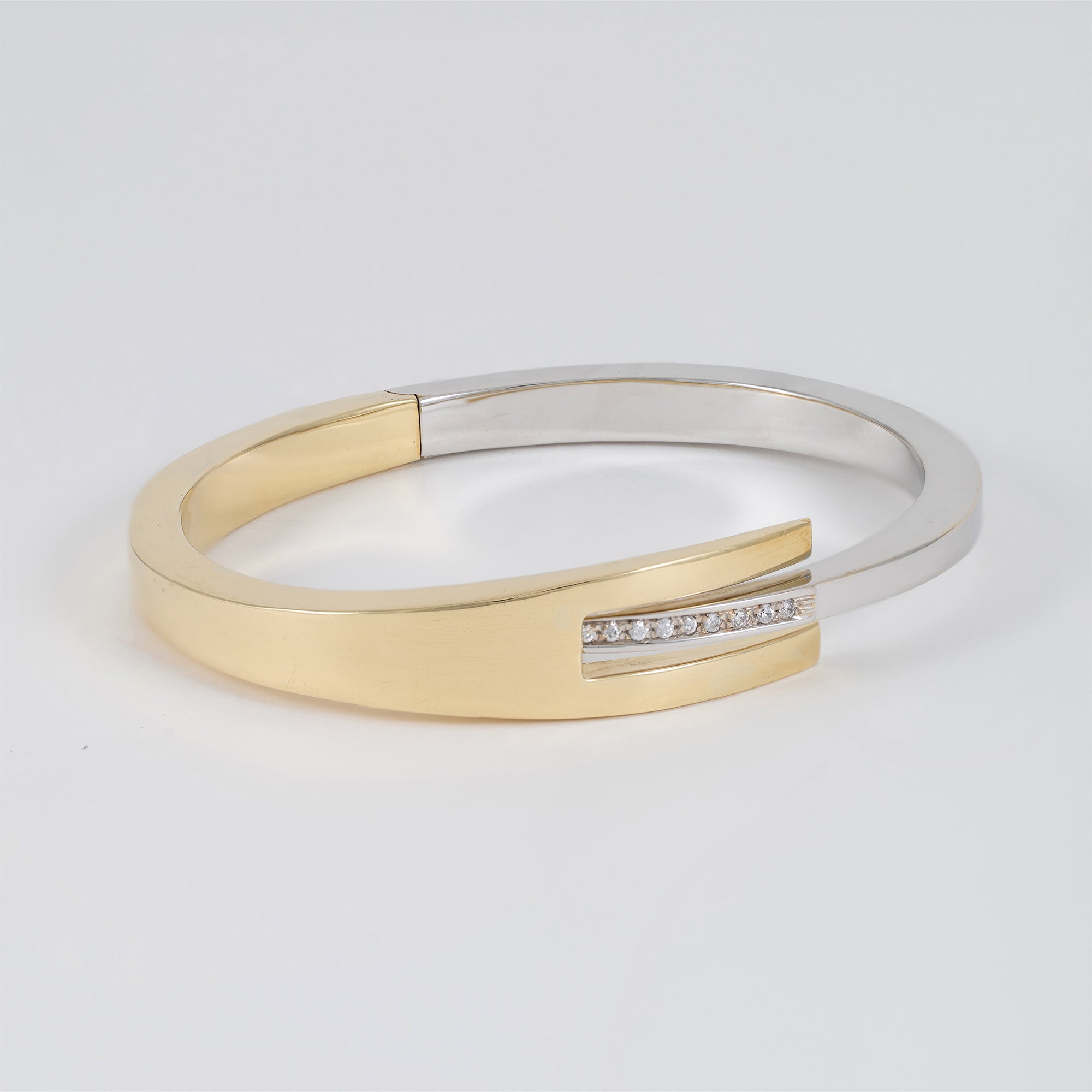 Pulsera en oro amarillo y blanco 18k 750