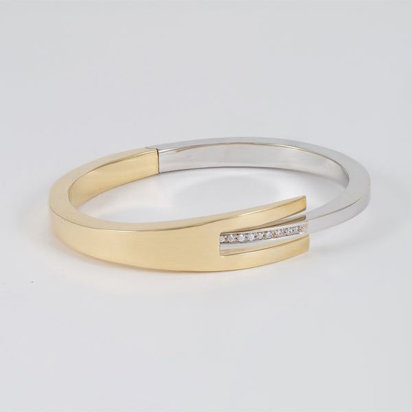 Pulsera en oro amarillo y blanco 18k 750