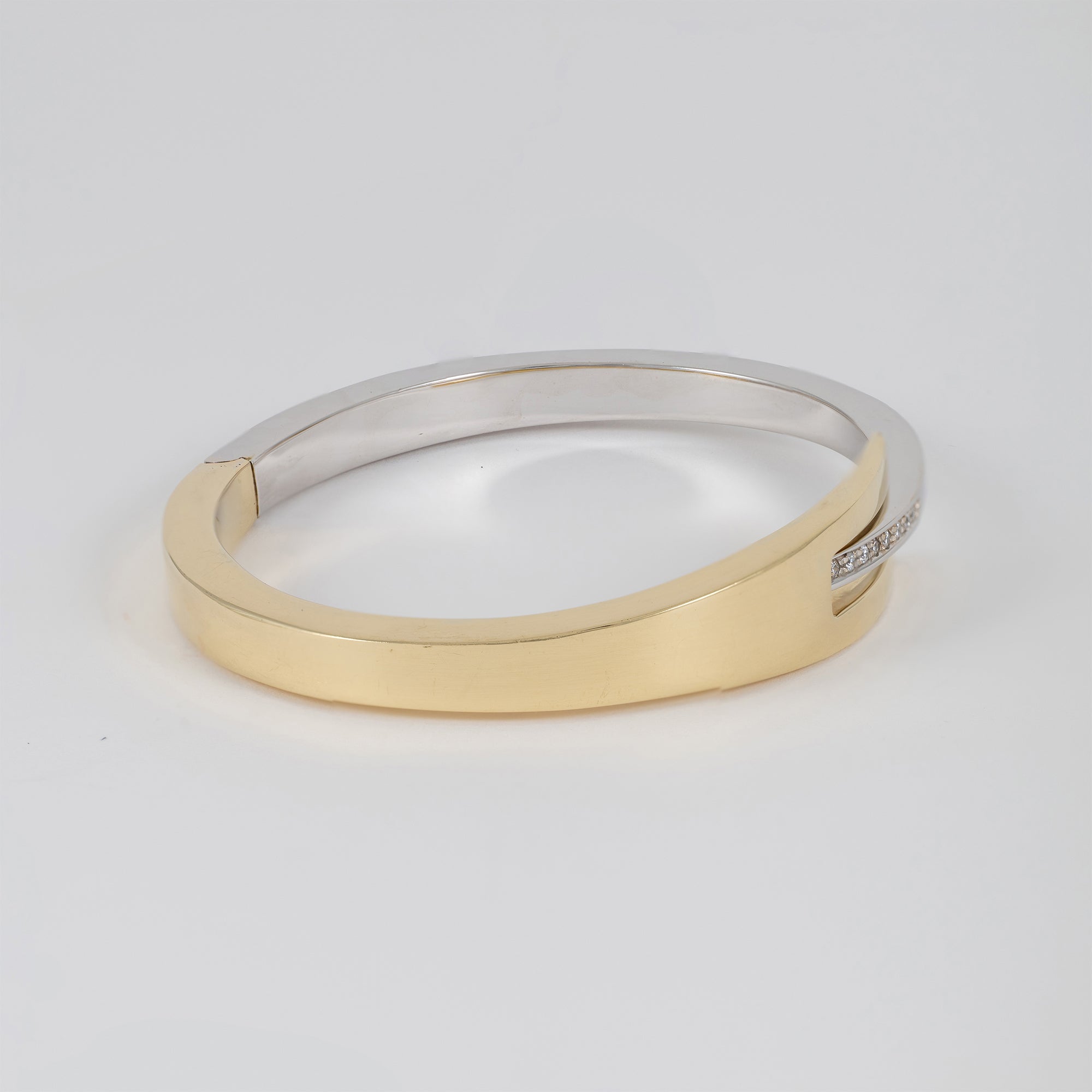 Pulsera en oro amarillo y blanco 18k 750
