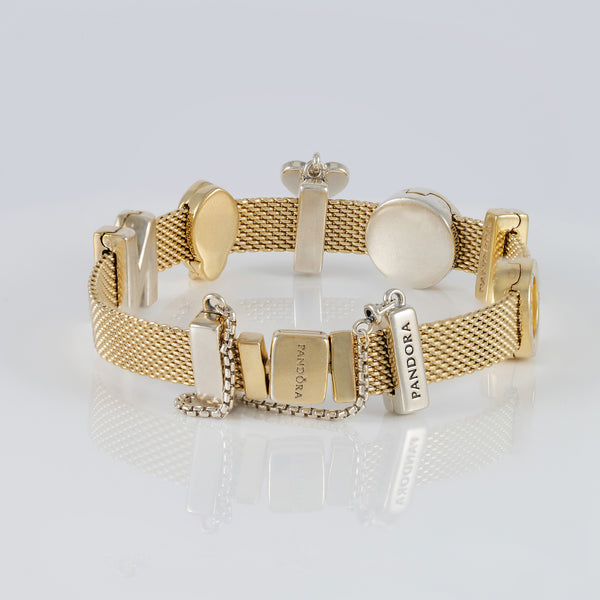 Pulsera Pandora Reflexions Plata con baño de oro 18k con Charms