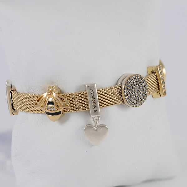 Pulsera Pandora Reflexions Plata con baño de oro 18k con Charms