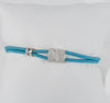 Pulsera Tous elástica turquesa con motivo Oso en plata 925