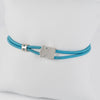 Pulsera Tous elástica turquesa con motivo Oso en plata 925