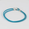 Pulsera Tous elástica turquesa con motivo Oso en plata 925