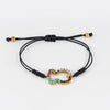 Pulsera Tous Oso en plata vermeil rosa con gemas y cordón negro Straight