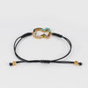 Pulsera Tous Oso en plata vermeil rosa con gemas y cordón negro Straight