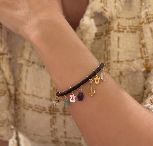 Pulsera Tous de cuero con motivos en oro amarillo 18k y gemas